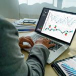 Worker analyzing data trends