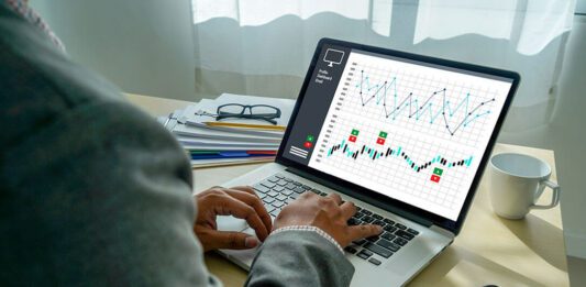 Worker analyzing data trends