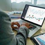 Worker analyzing data trends