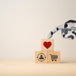 Robot hand stacking tiles with different inscripted icons.