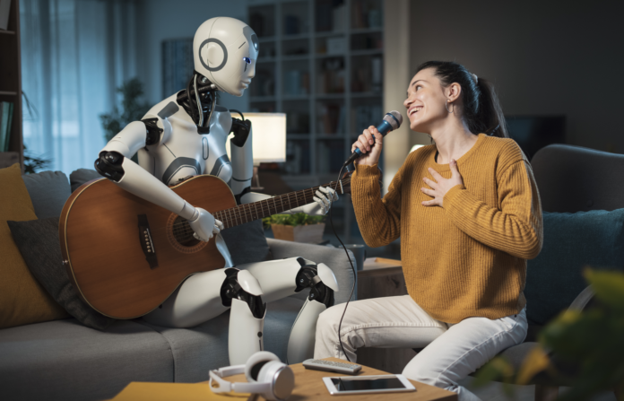 A robot playing a guitar and a woman singing with a microphone.