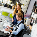 Two office workers in an office setting.