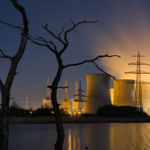 A nuclear power station during the night.