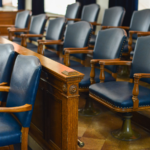Empty jury box with leather seats.