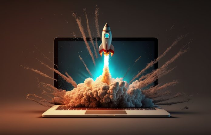 Launching space rocket from laptop screen.