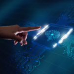 Hand interacting with a virtual microchip with a digitized brain icon.