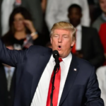 President Donald J. Trump speaking in front of an audience.