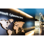 A hallway with Microsoft Cybercrime Center sign on the wall.