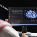 Engineer developing AI on a workstation.
