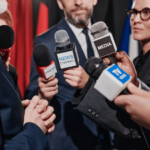 Journalist interviewing Businessman