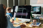 Stock photo of people writing code.