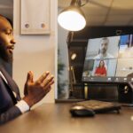 Stock photo of a remote job interview.