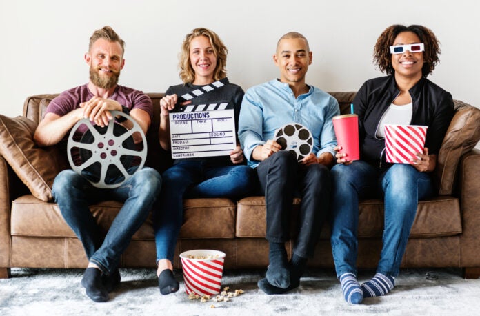 Friends watching movie together.