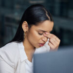 A stressed woman employee.