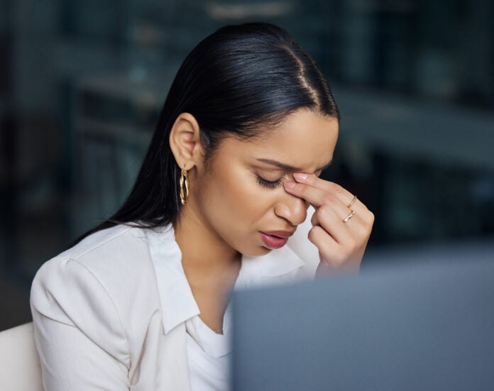 A stressed woman employee.