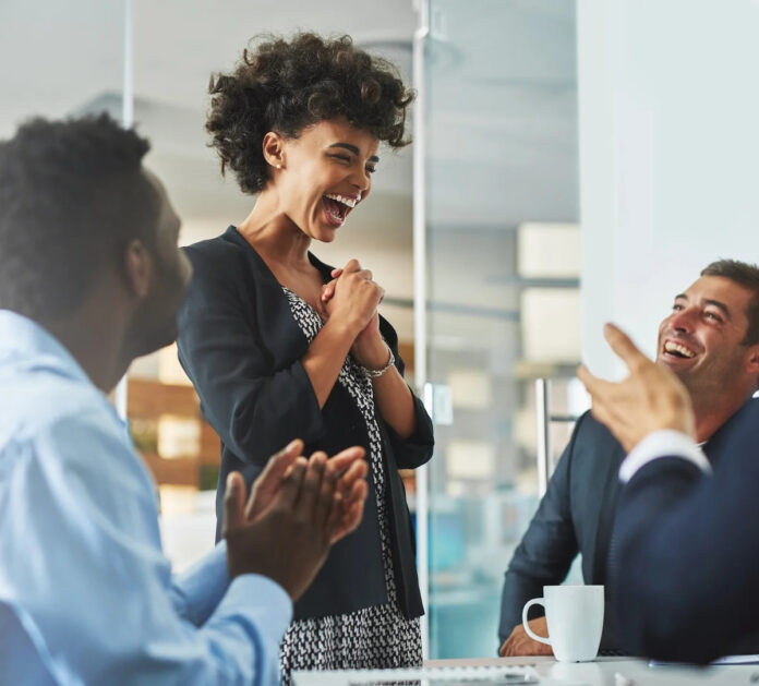 A group of employees or colleagues having fun while at work.